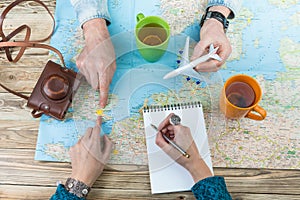 Young couple planning a family trip to London.