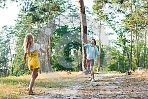 young couple playing badminton