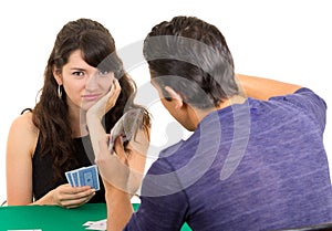 Young couple playing cards cuarenta