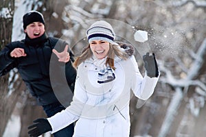 Young couple playing outdoors.