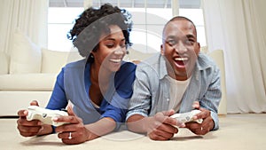 A young couple playing video games