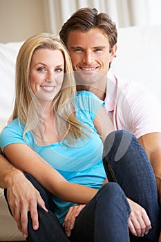 Young couple posing indoors