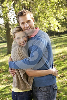 Young couple posing in park