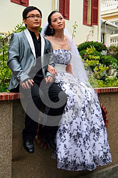 Young couple posing for wedding portfolio