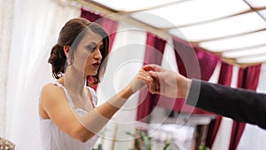 Young couple preparing their first dance for being incredible and not forget anything on a wedding ceremony.