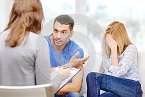 Young couple with a problem at psychologist office