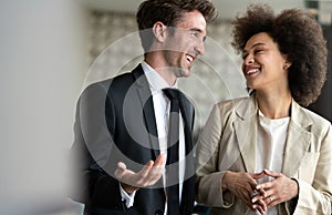 Young couple of professionals chatting during a coffee break