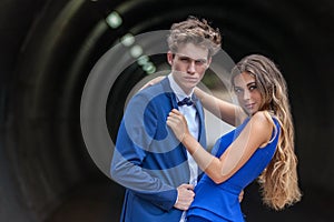 Young couple at prom posing