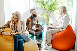 Young couple during the psychological counseling with psychologist