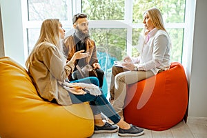 Young couple during the psychological counseling with psychologist