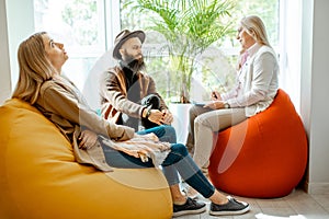 Young couple during the psychological counseling with psychologist