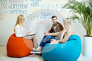 Young couple during the psychological counseling with psychologist