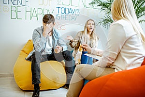 Young couple during the psychological counseling with psychologist