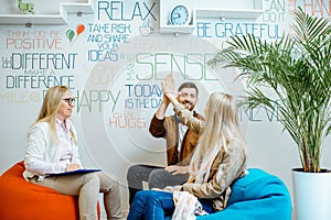 Young couple during the psychological counseling with psychologist