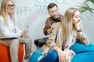 Young couple during the psychological counseling with psychologist