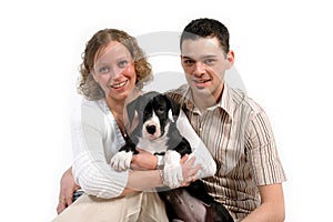 Young couple and puppy