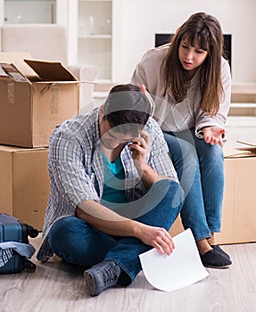 Young couple receiving foreclosure notice letter