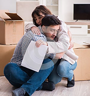 Young couple receiving foreclosure notice letter