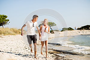 Young couple relaxing on the beach