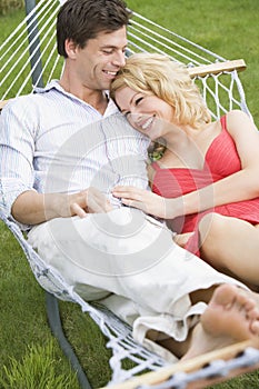 Young couple relaxing in hammock