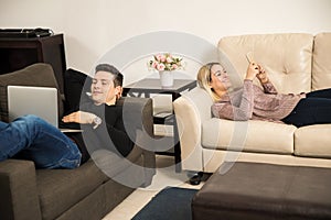 Young couple relaxing at home