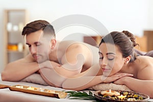 Young couple relaxing in spa salon