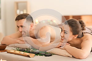 Young couple relaxing in spa salon