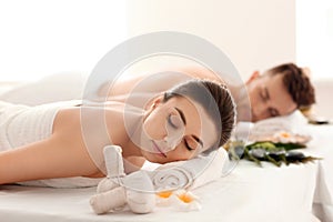 Young couple relaxing in spa salon