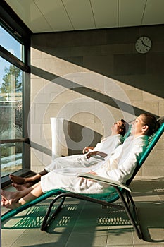 Young couple relaxing in wellness spa