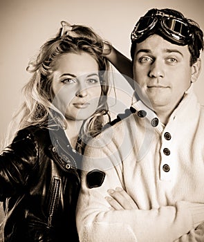 Young couple in retro style clothes