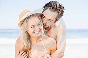 Young couple romancing on the beach