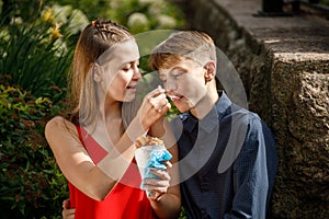 Young couple on a romantic date eating ice cream