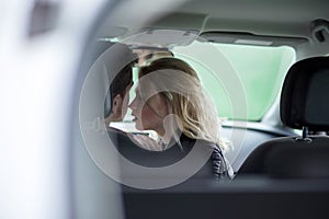 Young couple romantic sitting in car