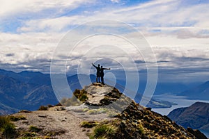 Young couple on Roys Peak New Zealand - Wanaka