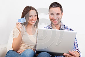 Young couple shopping online