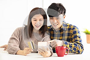 Young couple  shopping online by smart phone