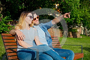 Young couple sitting on bench