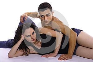 Young couple sitting on the floor