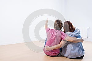 Young couple sitting in a room