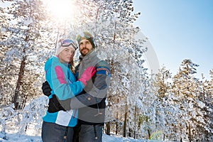 Young couple on ski vacation at mountain