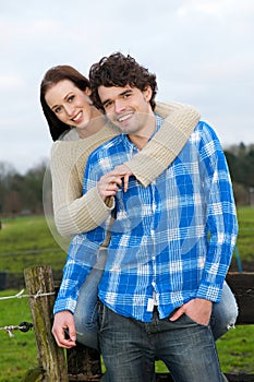 Young Couple Smiling Outdoors