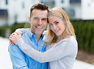 Young couple smiling outdoors