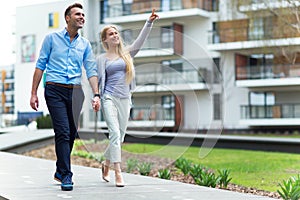 Young couple smiling outdoors