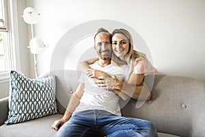 Young couple on the sofa relaxing at home