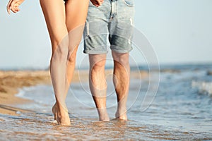 Young couple spending time together on beach