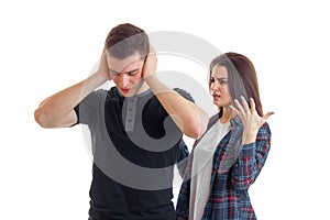 A young couple standing near and ascertain relationships gesticulating hands