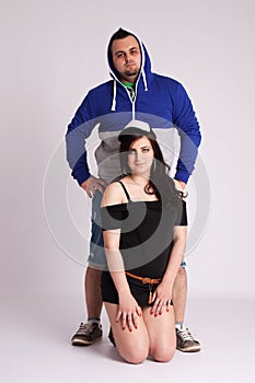 Young couple in studio