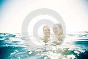 Young Couple Swimming