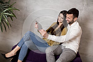 Young couple with tablet