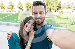 Young couple take selfie